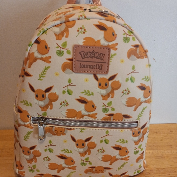 Loungefly Handbags - NWT Pokemon Loungefly Eevee mini backpack